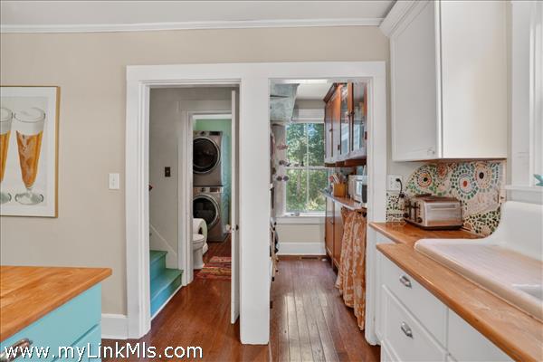 Half bath with laundry and walk-in pantry