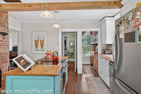 Kitchen Island and cabinets by French Accent