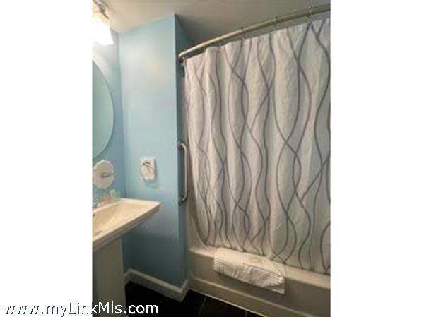 full bath centrally located in condo