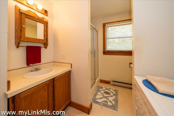 First floor full bathroom with laundry