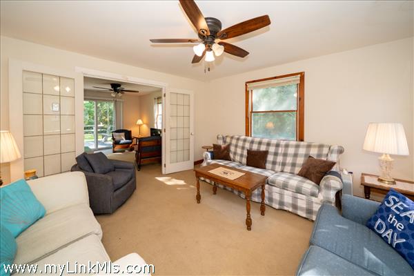 Den with french doors to the living room