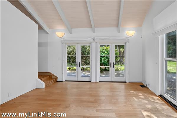 Living room and stairs to loft