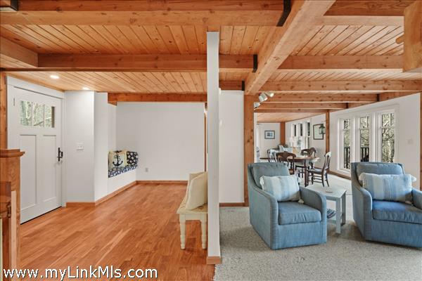View from kitchen to living area and front entry