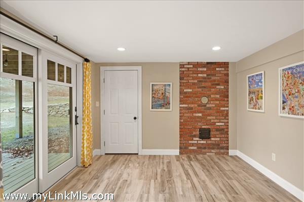 Sliders to yard and door to garage