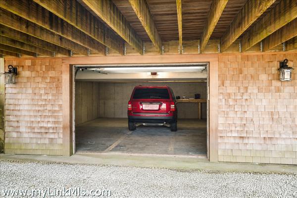 Lower level garage with access under deck