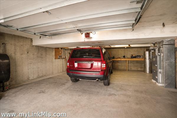 2 car garage with built in shelves/work bench