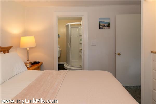 bedroom showing bathroom entrance