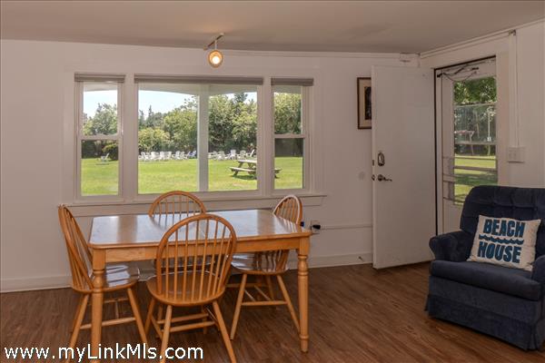 big window brightens the whole place and offers incredible view of one common area in front of Building C