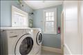 Laundry room by the kitchen