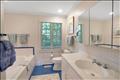 1st floor primary bedroom en-suite bath