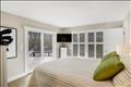 First-floor flex room with en suite bath.