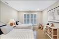 Second floor guest bedroom with en suite bath.