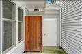 Outdoor shower with mahogany enclosure.