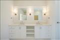 2nd floor primary bathroom with free standing tub, shower stall and private toilet room