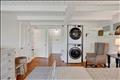 Lower-level bedroom with en suite bath.