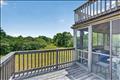 Deck wraps around the whole house.