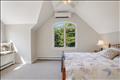 primary en-suite with private lounge area and private exterior deck