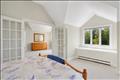 primary en-suite with private lounge area and private exterior deck