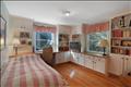 Bedroom with built in cabinetry