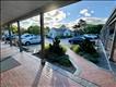 Brick pathways and pleasant landscaping welcomes customers.