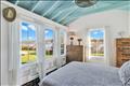 Bedroom with waterviews
