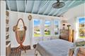 Bedroom with waterviews
