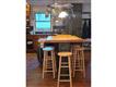 Kitchen view with back to dining area