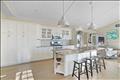Open floor plan with center kitchen