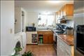 Kitchen with side by side Washer & Dryer