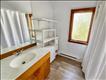 Bath features both a tub and shower