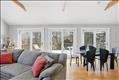 Livingroom and  dining room to extended deck area perfect for entertaining