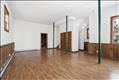 Large basement with eighteen foot ceiling and full bath.