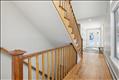 Wood flooring throughout the home with beautiful cherry stairways.