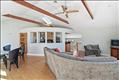 Livingroom to kitchen high vaulted ceilings