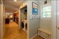 Washer/dryer area adjacent to the kitchen.