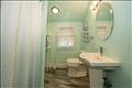 Beautiful full bathroom in the bonus space above the garage.