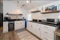 Kitchen in bonus space.