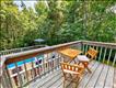 Primary bedroom balcony overlooking the swim spa