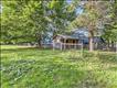 2 bay horse barn, chicken coop and then separate primary barn