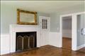 Family room with historic King's board flooring and second fireplace