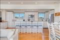 Open kitchen with large island with ample seating