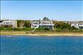 Aerial perspective highlighting the property's expansive frontage on Katama Bay.