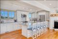 Open kitchen with large island with ample seating