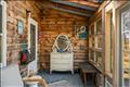 Main House has so many charming places to gather - enclosed three-season porch