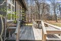 Main house front deck with bench seating and dining for 10 or more
