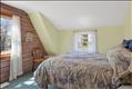 2nd flr - Bedroom 3 charming and bright with wood accent wall