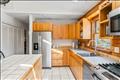 Guest house features kitchen propane stove, stainless steel appliances and beautiful natural light