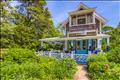 Surrounded by mature perennial Gardens