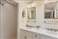 with double sinks and marble countertop