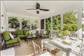With a fabulous screened porch